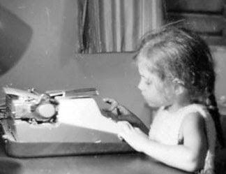 Elizabeth Wein with her first typewriter as a small child